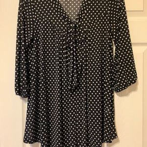 Women’s black-and-white polkadot, sheer top